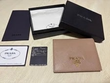 Prada — Prada Bi-fold Wallet 1MV204 — Handbag — resale