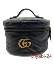 Gucci — Gucci GG Marmont Backpack — Handbag — resale