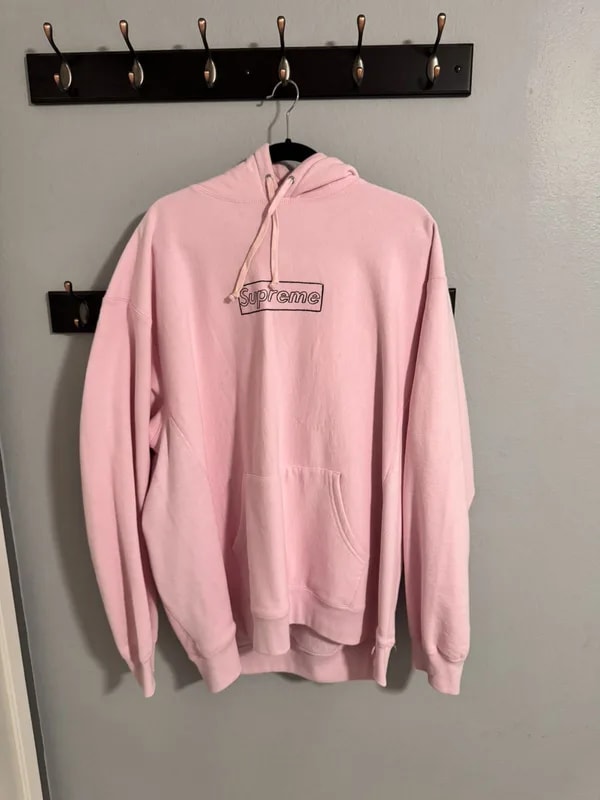 Supreme — Supreme Kaws Hooded Sweatshirt — streetwear — resale