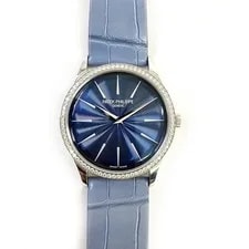 Patek Philippe — Patek Philippe Calatrava 4997/200G-001 White Gold Blue Dial With Papers — Watch — resale