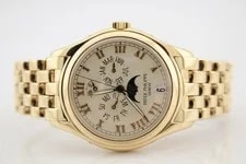 Patek Philippe — Patek Philippe Annual Calendar 18k Yellow Gold Ivory Dial 37mm 5036J — Watch — resale