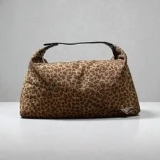 Bottega Veneta — Bottega Veneta Vanity Pouch Leopard Condition Good — Handbag — resale