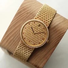 Audemars Piguet — Audemars Piguet Cobra 31mm 18K Yellow Gold Diamond Ruby Bamboo — Watch — resale
