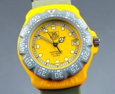 Tag Heuer — *Exc+5* TAG Heuer 382.513-1 Yellow & Gray Date 35mm Quartz — Watch — resale
