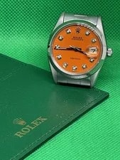 Rolex — Rolex Oyster Perpetual Date 34mm Orange Diamond Dial w/Travel Case & Card Holder — Watch — resale
