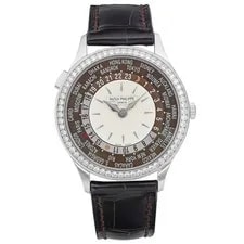 Patek Philippe — Patek Philippe World Time 18K White Gold Opaline Dial Automatic 7130G-001 — Watch — resale