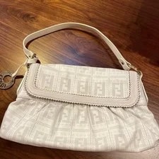 Fendi — Fendi Perforated Logo Charm Flap — Handbag — resale