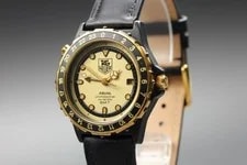 Tag Heuer — Tag Heuer Airline 896.513 Gold Black Date Quartz Near — Watch — resale