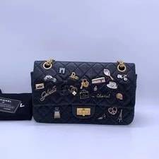 Chanel — Chanel 2.55 Reissue Lucky Charms Aged Flap Limited Edition — Handbag — resale