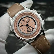Patek Philippe — Patek Philippe World Time Chronograph Flyback 5935A-001 Salmon Steel Complete — Watch — resale
