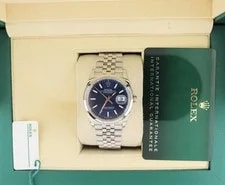 Rolex — 2025 Rolex Datejust 126200 Blue Dial Smooth Bezel SS Jubilee With Papers 36mm — Watch — resale