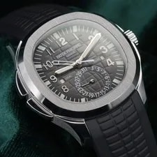 Patek Philippe — Patek Philippe Aquanaut Travel Time Black Dial Steel Complete SET 5164A-001 — Watch — resale