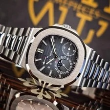 Patek Philippe — Patek Philippe Nautilus 5712 40MM Blue Dial Steel Moonphase Date B&P — Watch — resale