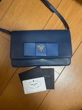 Prada — Prada Ribbon Pochette Wallet With Guarantee and Storage From Japan — Handbag — resale
