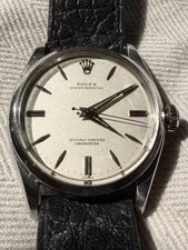 Rolex — Rolex Oyster Perpetual Automatic Chronometer Silver Dial Black Leather 34mm — Watch — resale