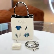 Prada — Prada Bucket Top Handle Heart Lightning Enamel Badge — Handbag — resale