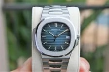 Patek Philippe — Patek Philippe Nautilus 5711/1A-010 Stainless Steel Blue Dial Complete Set — Watch — resale