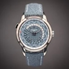 Patek Philippe — Patek Philippe World Time Date | 18k White Gold | Ref. 5330G-001 | Full Set — Watch — resale