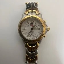 TAG Heuer — Maintenance-Free Discounted Price: TAG Heuer Cell Chronograph — Watch — resale