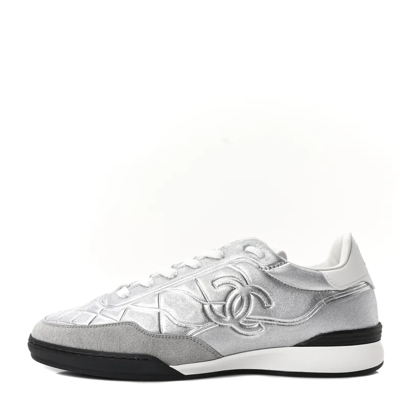 Chanel — Laminated Quilted CC Sneakers — Sneaker — resale