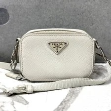 Prada — Prada Mini Crossbody Triangle Logo Auth — Handbag — resale