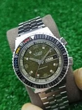 Breitling — Vtg Sicura Breitling Twin Crown Diver 25J Automatic Green Textured Dial — Watch — resale