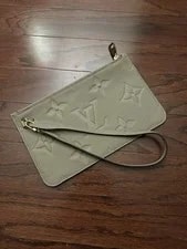 Louis Vuitton — Louis Vuitton Neverfull Wristlet Turtledove New — Handbag — resale