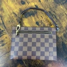 Louis Vuitton — Authentic Louis Vuitton Neverfull Wristlet Pochette — Handbag — resale
