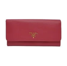Prada — Prada Cowhide Cross Patterned Wallet Good Condition — Handbag — resale