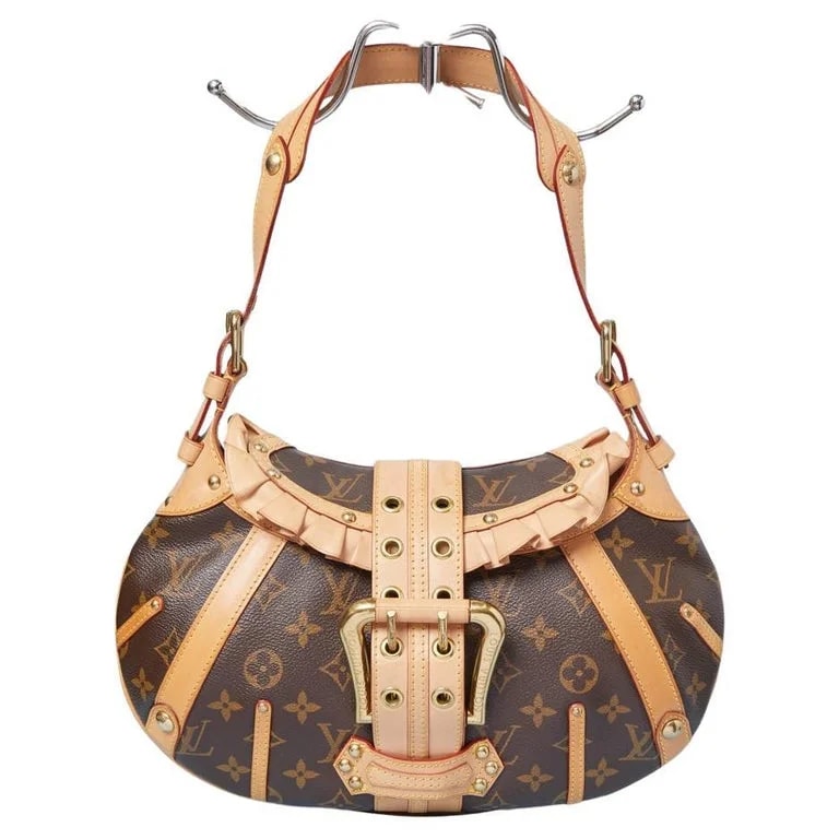 Louis Vuitton — Theda Monogramme Bag Louis Vuitton — Designer Shoe — resale