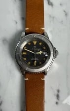 Tudor — Tudor Submariner Snowflake 9411/0 Blue Confetti Dial Pumpkin Patina 1976 — Watch — resale
