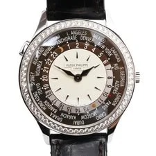 Patek Philippe — 2011 Patek Philippe 7130G-001 36mm World Time 18K White Gold Opaline Dial — Watch — resale