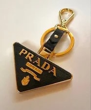 Prada — Excellent Condition Prada Key Holder Charm Triangle Plate From Japa — Handbag — resale