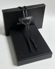 Prada — Prada Logo Bolo Tie Triangular Plate With Box — Handbag — resale