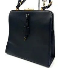 Prada — Prada Classic Frame Top Handle With Lock — Handbag — resale