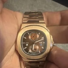 Patek Philippe — Patek Philippe Nautilus 40mm Brown Dial Automatic Rose Gold Tone 120m WR — Watch — resale