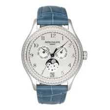 Patek Philippe — NOS Patek Philippe Annual Calendar 4947G Silver Dial Box Papers — Watch — resale