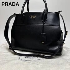 Prada — Prada Paradigm Crossbody — Handbag — resale