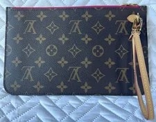Louis Vuitton — Authentic Louis Vuitton Neverfull Wristlet Excellent — Handbag — resale