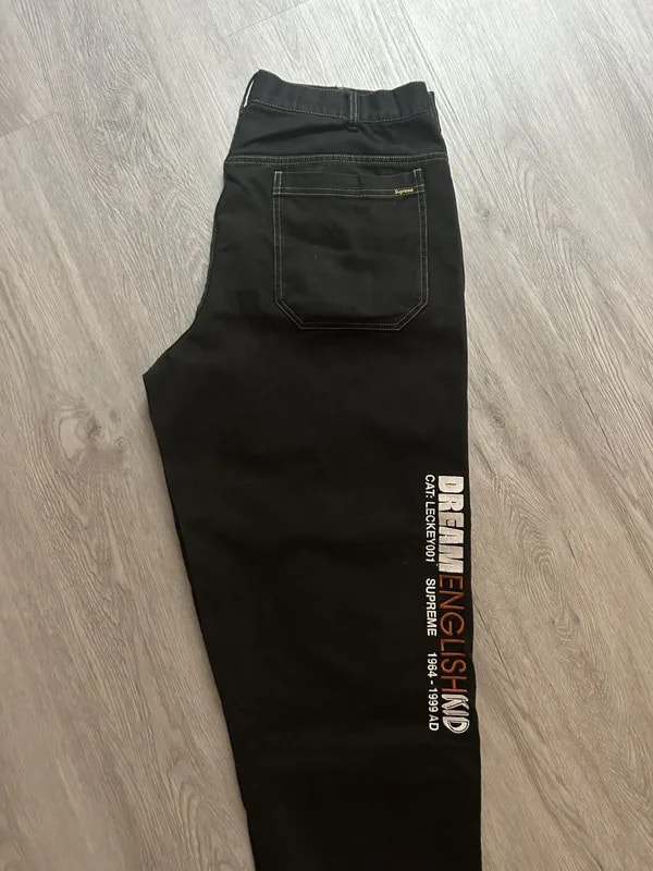 Supreme — Supreme Mark Leckey Dream English Kid Twill Pants — Handbag — resale