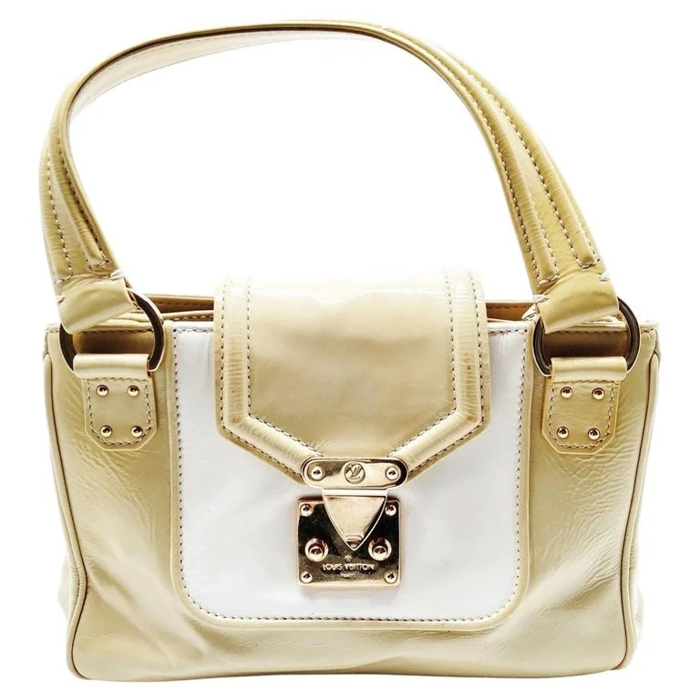 Louis Vuitton — A Louis Vuitton and Cruise Hand-Bag — Designer Shoe — resale