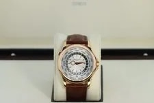Patek Philippe — Patek Philippe World Time 5130R-001 Geneve Seal, Silver Guilloche Dial Rose Gold — Watch — resale