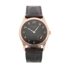 Patek Philippe — Patek Philippe Calatrava Automatic Rose Gold 33mm Black Dial Strap 5026R — Watch — resale