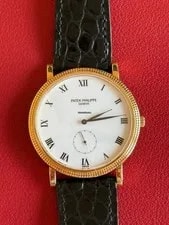 Patek Philippe — Patek Philippe Calatrava 18k Yellow Gold ’S - 3919J - Manual - Service Papers — Watch — resale