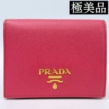 Prada — Excellent Condition Prada Metal Logo Compact Wallet 1MV204 From — Handbag — resale