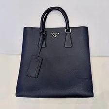 Prada — Prada North South Triangle Logo — Handbag — resale