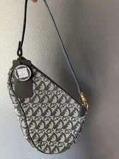 Dior — Dior Mini Saddle Trotter Pochette — Handbag — resale