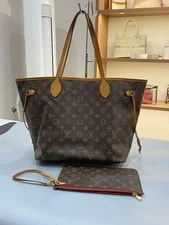 Louis Vuitton — Louis Vuitton Authentic Neverfull Medium-sized Wallet — Handbag — resale