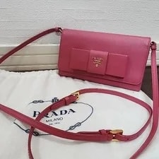Prada — Prada Wallet Ribbon Charm — Handbag — resale