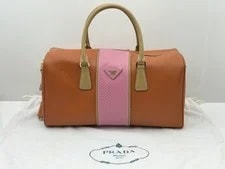 Prada — Prada Boston Papaya Perforated Stachel — Handbag — resale